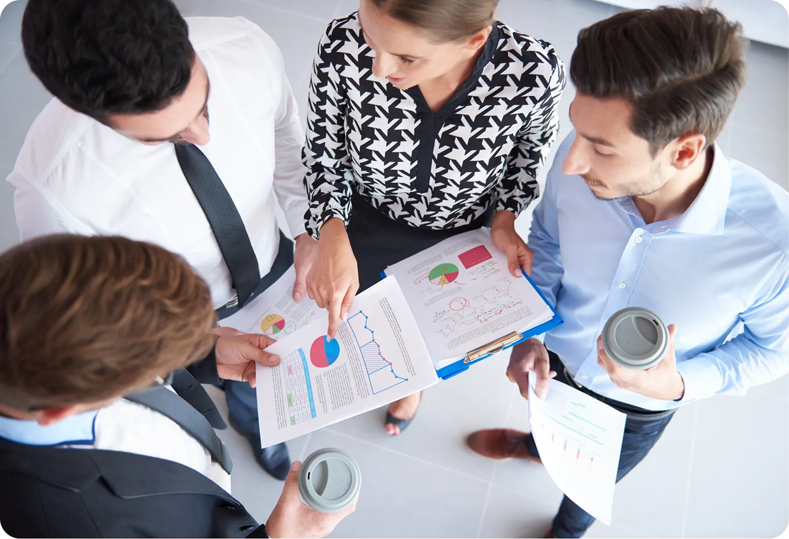 Tyrone Harrison reviewing performance reporting with a client team